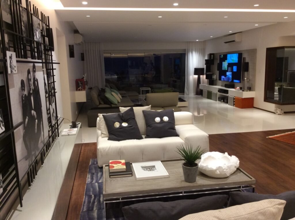 Juhu beachfront apartment living room with surround sound and a large TV