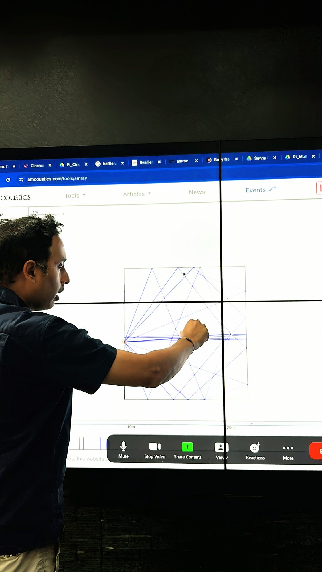 Trainer explaining a room measurement graph on screen