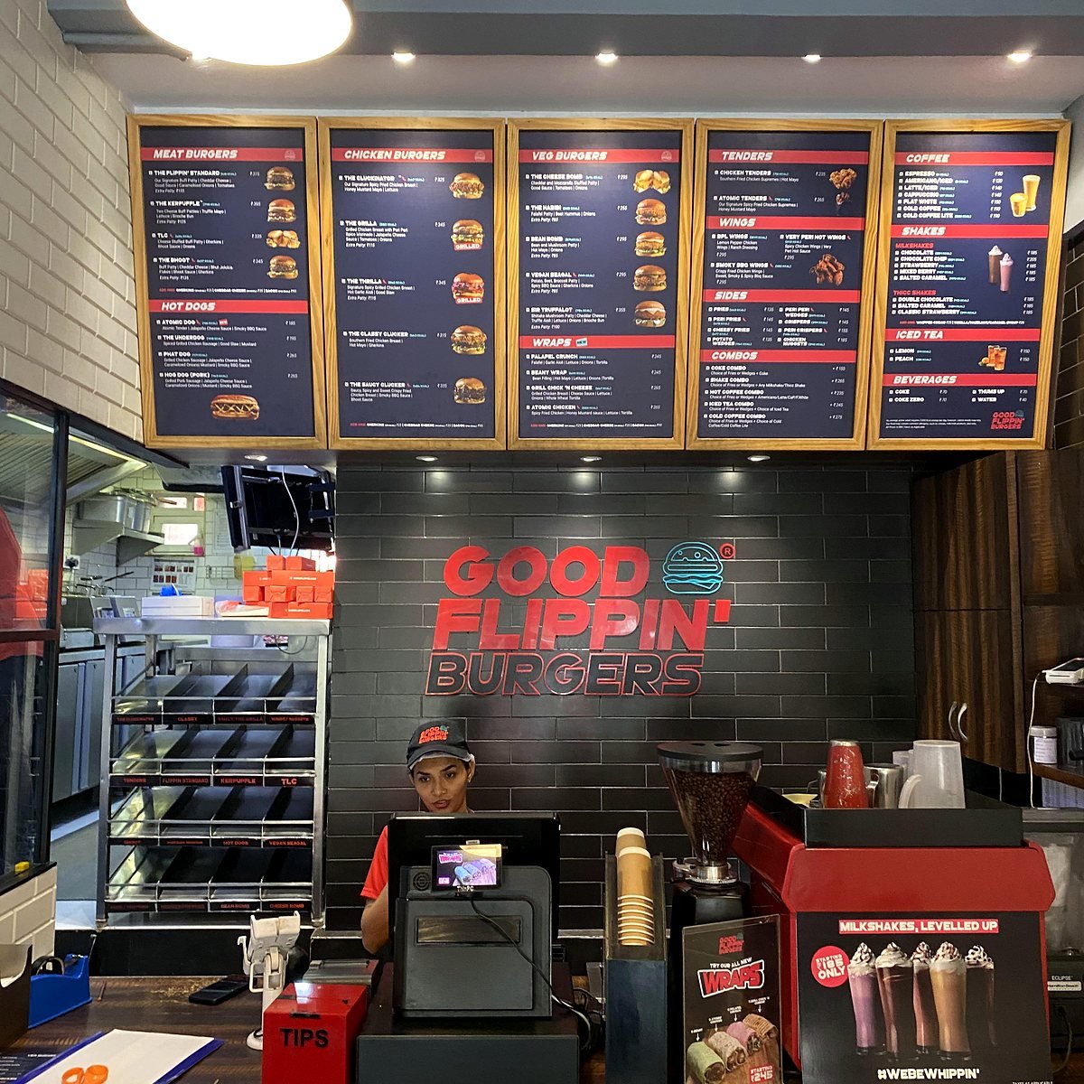Ordering counter and menu boards of a burger restaurant in Bandra