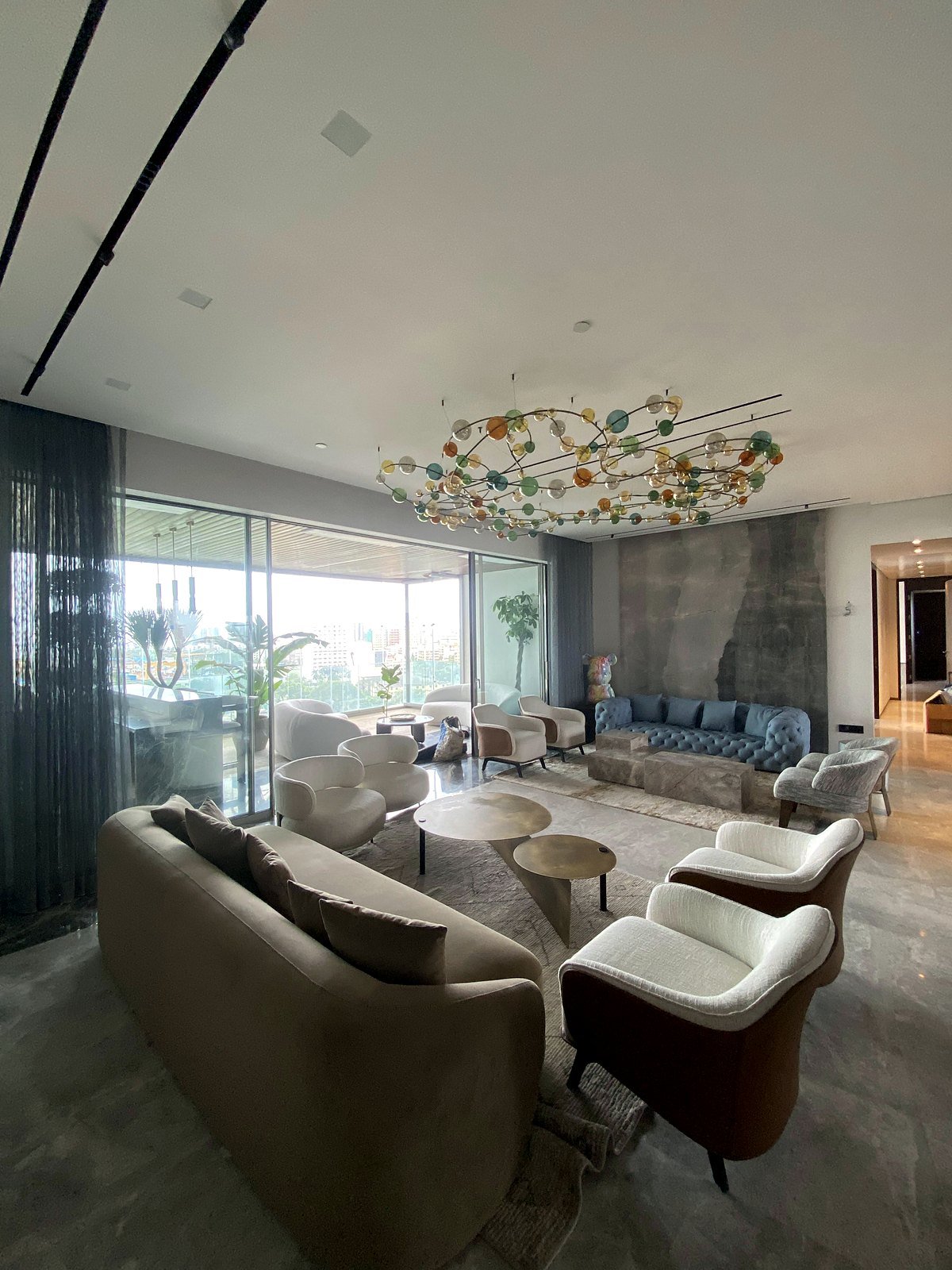 Wide view of an open living room in a Bandra smart apartment