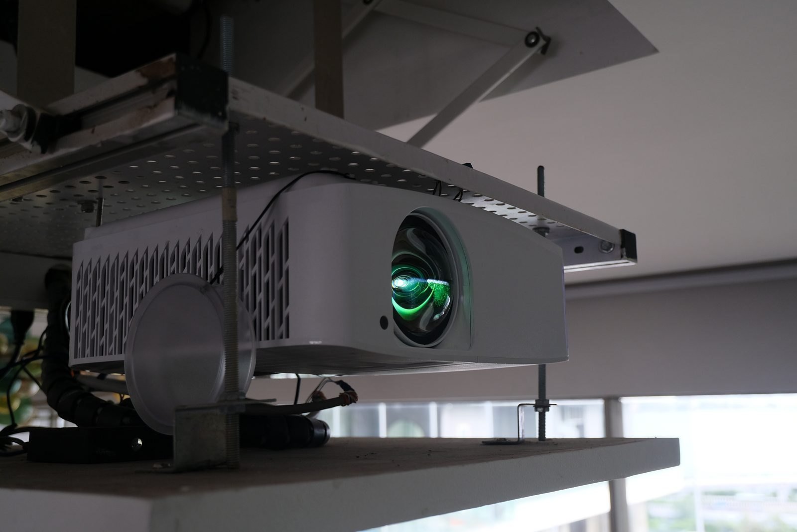 Projector on a motorised ceiling lift in a Bandra apartment