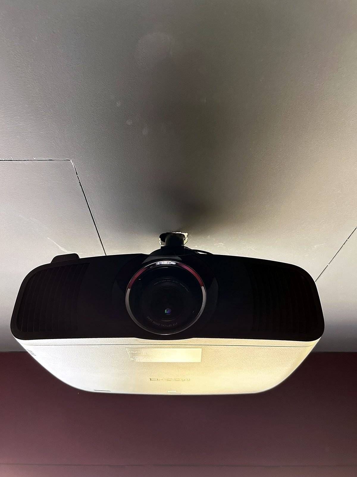 Epson 4K laser projector on a ceiling mount in a Goa home theatre