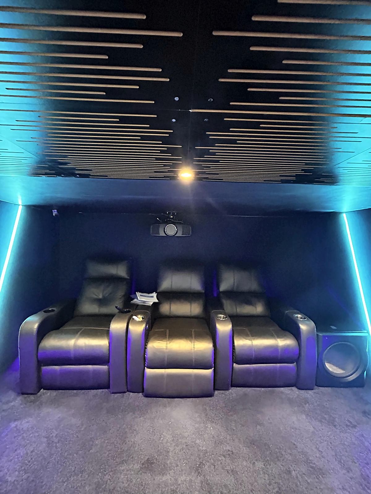 Three-seat recliner row in the dedicated home theatre at Avenue Sound Seawoods