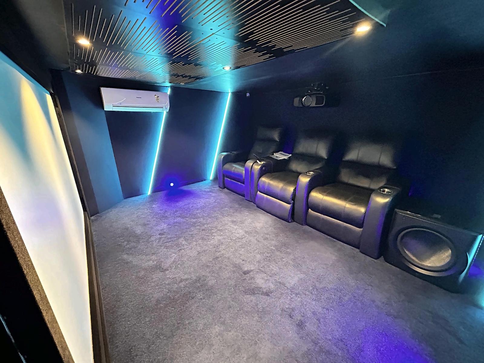 Recliner seating and ambient lighting in the Seawoods home theatre demo room