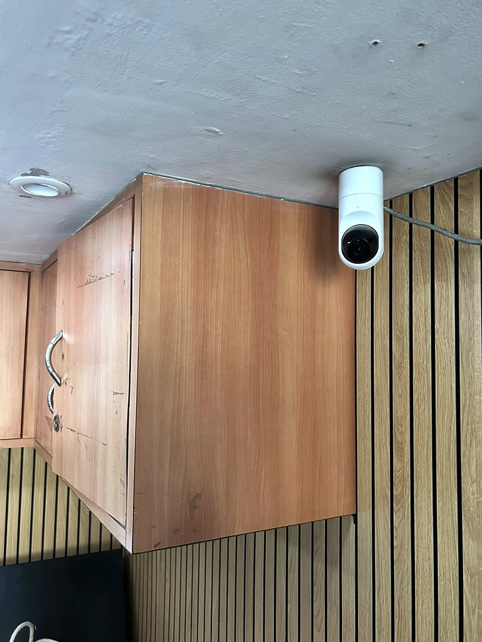 Smart security camera covering an office at Avenue Sound Seawoods, viewable on mobile